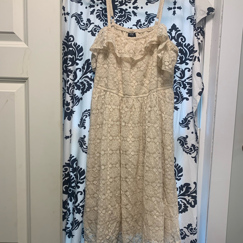 Torrid summer dress. Open shoulder concept with straps. Above knee length.
